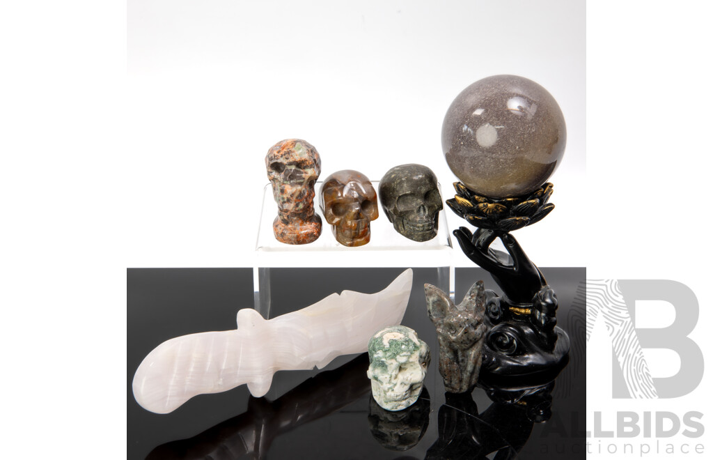 Collection Carved Polished Stone Pieces Including Three Memento Mori Skulls Sphere on Composite Stand and More