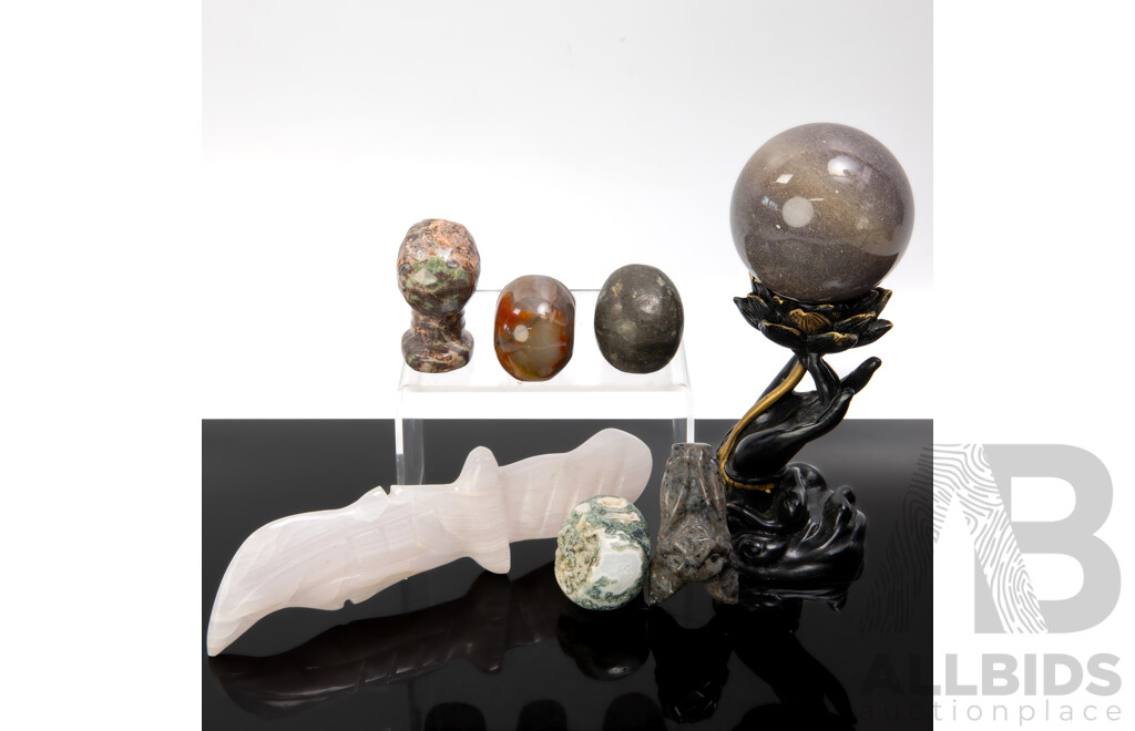 Collection Carved Polished Stone Pieces Including Three Memento Mori Skulls Sphere on Composite Stand and More