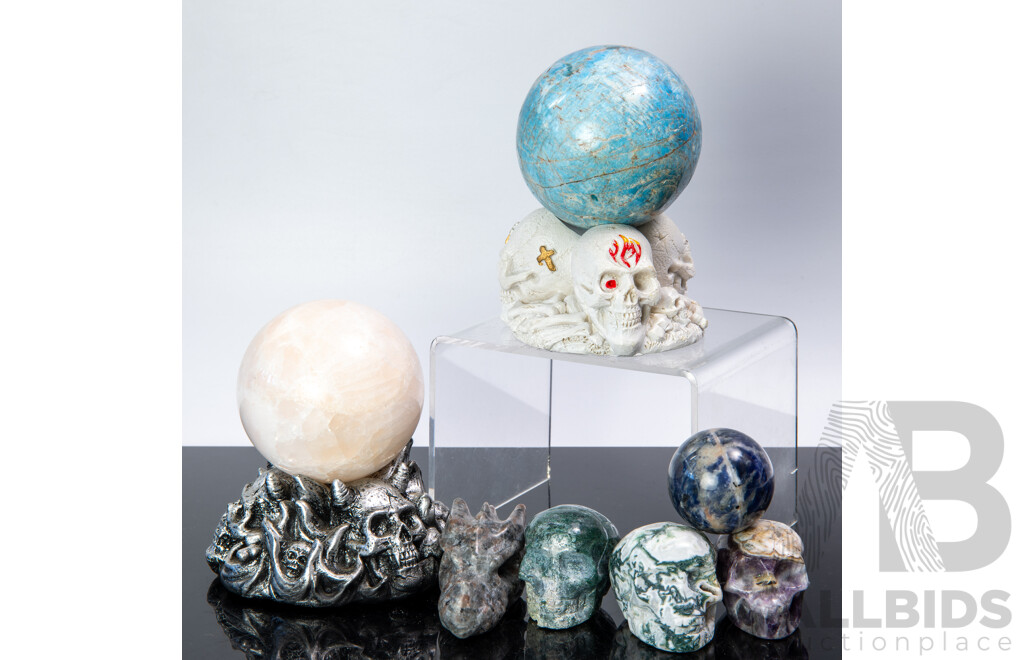 Collection Carved Polished Stone Pieces Including Three Memento Mori Skulls, Two Spheres on Composite Stand and More