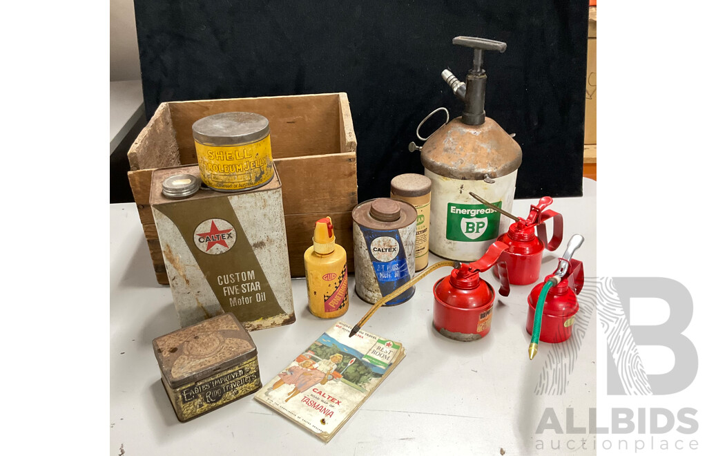 Collection of Vintage Oil Tins Including Shell Petroleum Jelly with Embossed Lid, Caltex Custom Five Star and Two Stroke, BP Grease with Pump, Engineers Oilers