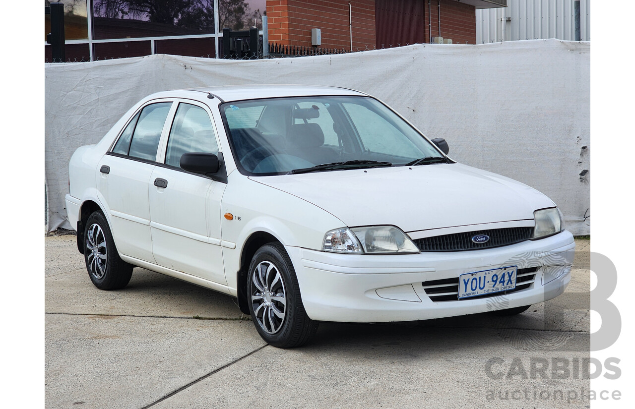 12/1999 Ford Laser LXi KJIII 4d Sedan White 1.6L