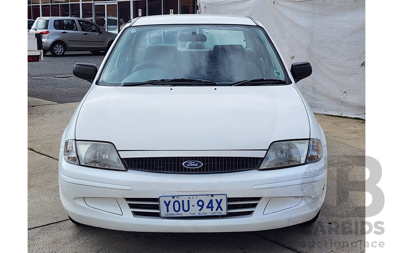 12/1999 Ford Laser LXi KJIII 4d Sedan White 1.6L