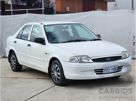 12/1999 Ford Laser LXi KJIII 4d Sedan White 1.6L