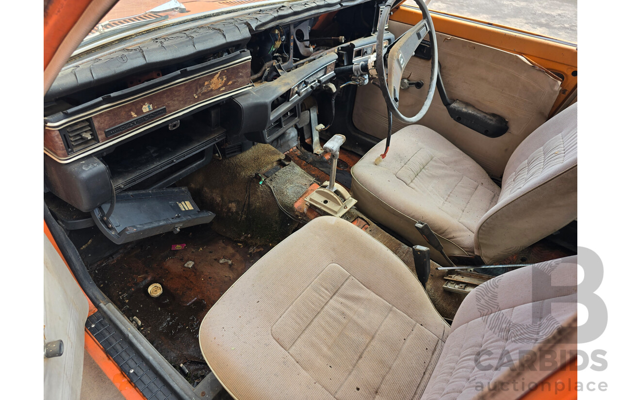 7/1974 Datsun 180B GX P610 4d Wagon Orange 1.8L