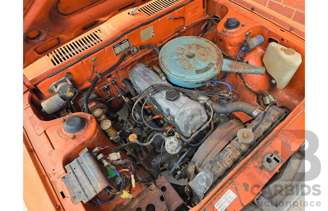 7/1974 Datsun 180B GX P610 4d Wagon Orange 1.8L