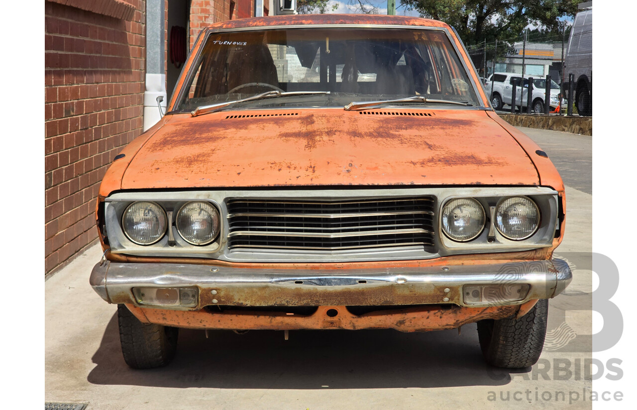 7/1974 Datsun 180B GX P610 4d Wagon Orange 1.8L