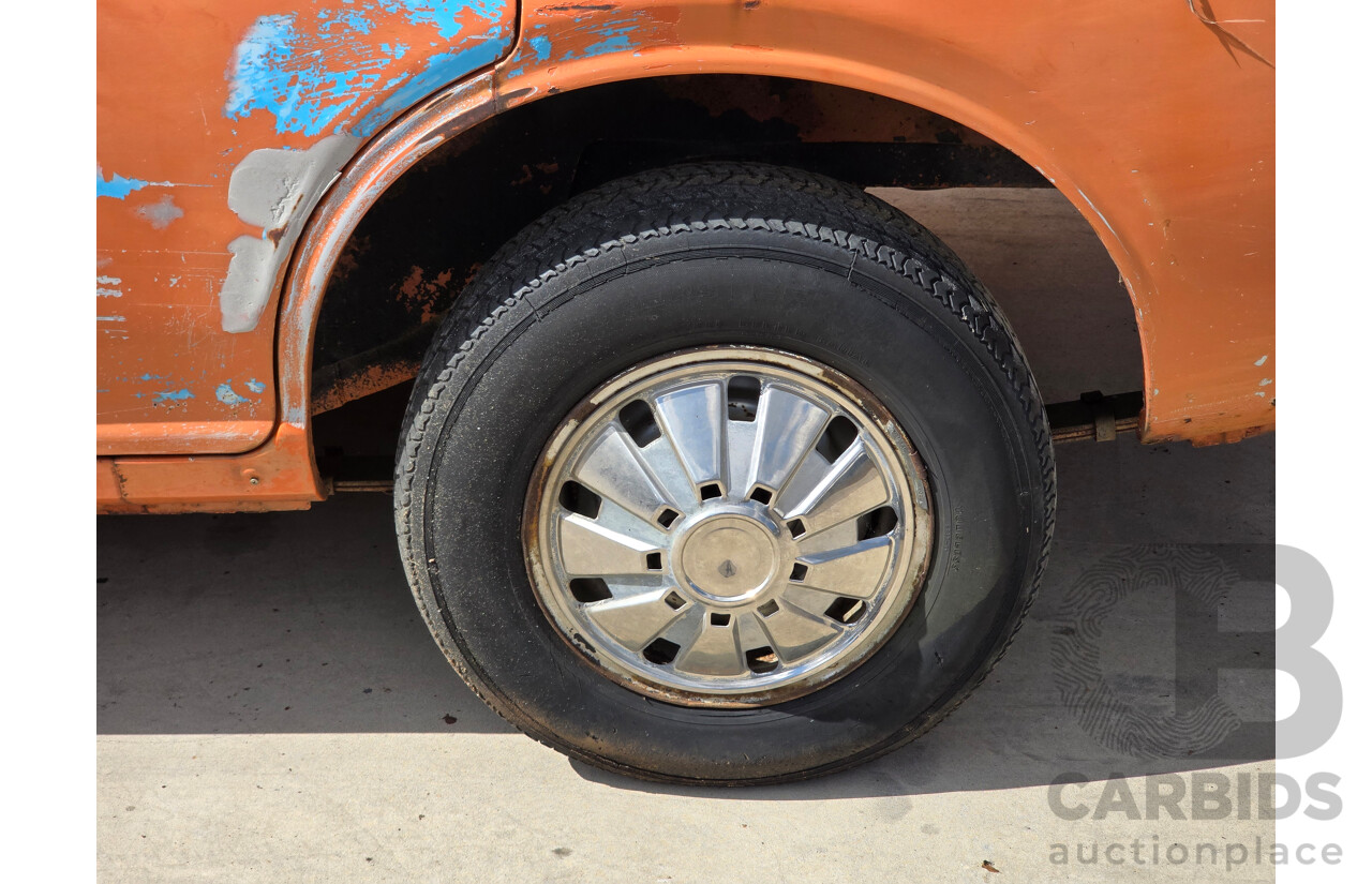 7/1974 Datsun 180B GX P610 4d Wagon Orange 1.8L