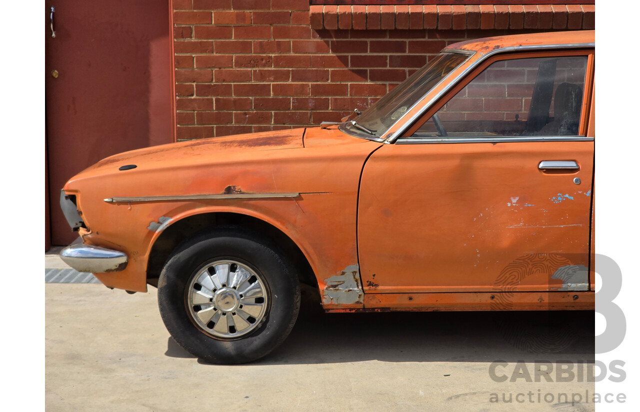 7/1974 Datsun 180B GX P610 4d Wagon Orange 1.8L