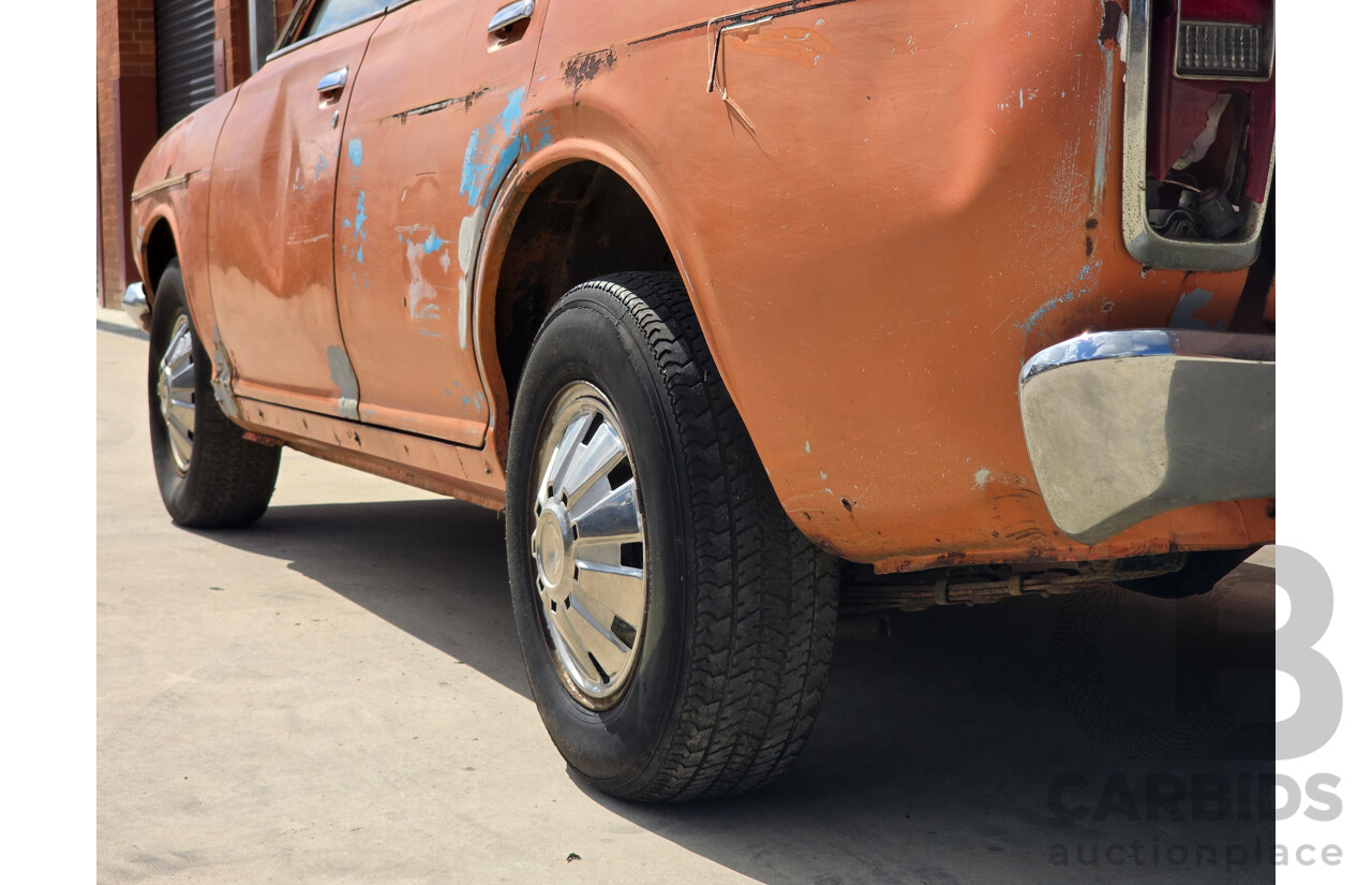 7/1974 Datsun 180B GX P610 4d Wagon Orange 1.8L