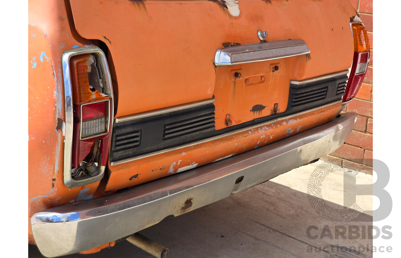 7/1974 Datsun 180B GX P610 4d Wagon Orange 1.8L