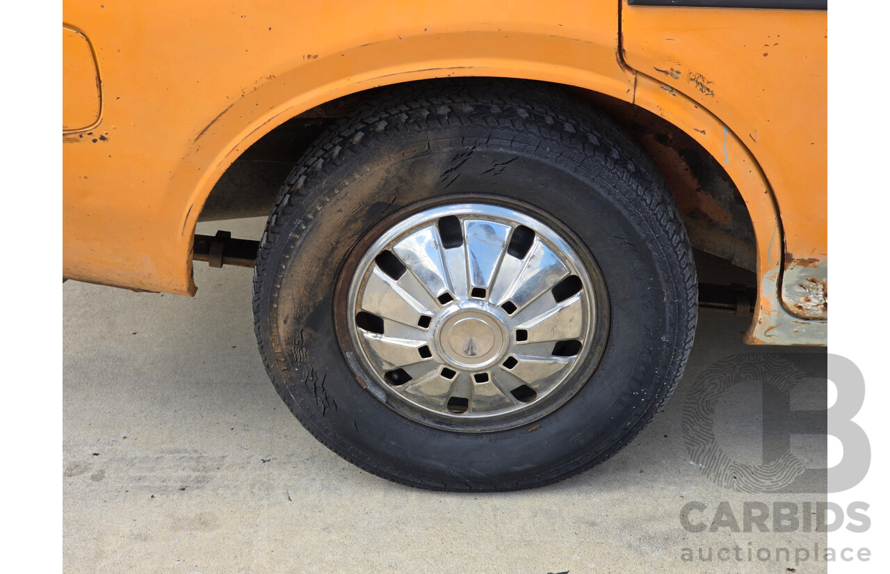 7/1974 Datsun 180B GX P610 4d Wagon Orange 1.8L