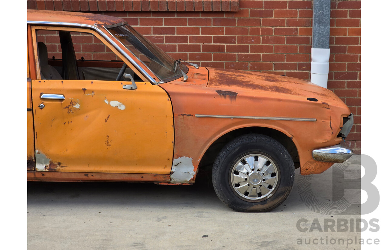 7/1974 Datsun 180B GX P610 4d Wagon Orange 1.8L