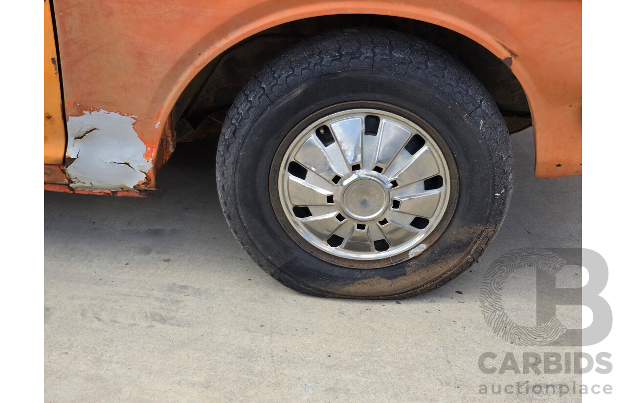 7/1974 Datsun 180B GX P610 4d Wagon Orange 1.8L