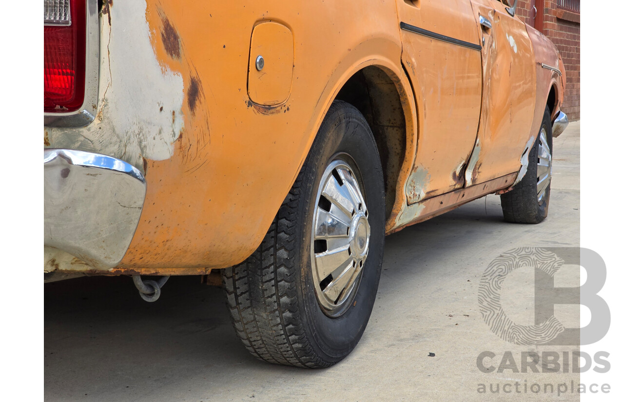 7/1974 Datsun 180B GX P610 4d Wagon Orange 1.8L