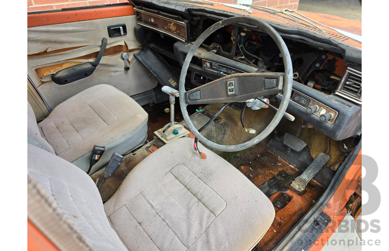 7/1974 Datsun 180B GX P610 4d Wagon Orange 1.8L