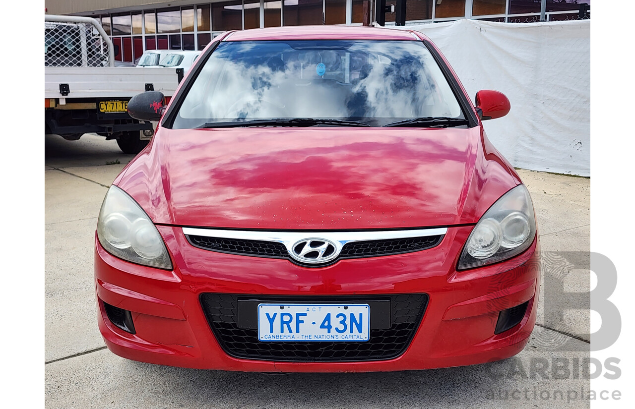 3/2012 Hyundai i30 SX FD MY12 5d Hatchback Red 2.0L