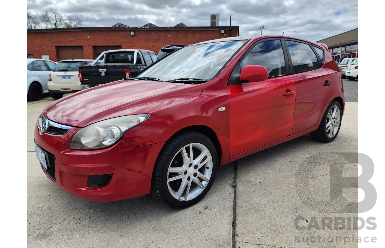 3/2012 Hyundai i30 SX FD MY12 5d Hatchback Red 2.0L