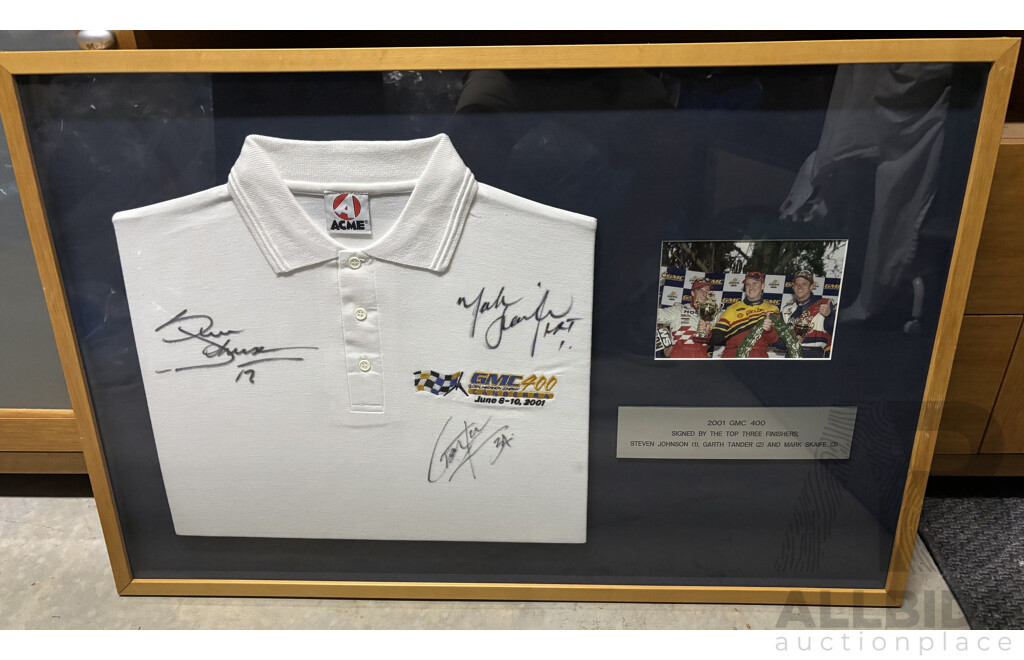 L105 - Framed 2001 GMC 400 polo shirt signed by top three finishers - Steven Johnson, Garth Tander and Mark Skaife