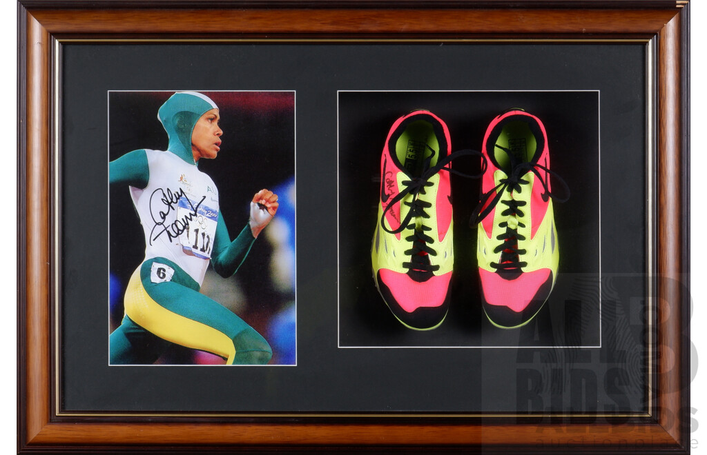 L42 - Cathy Freeman framed shoes signed by Cathy with Certificate of Authenticity