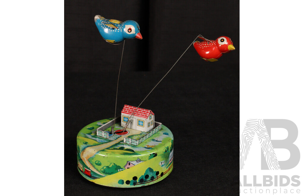 Vintage T.R.S Pressed Steel Clockwork Chirping/Rotating Bird Toy, Made in Japan