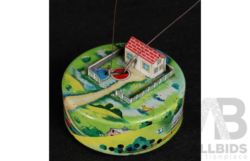 Vintage T.R.S Pressed Steel Clockwork Chirping/Rotating Bird Toy, Made in Japan
