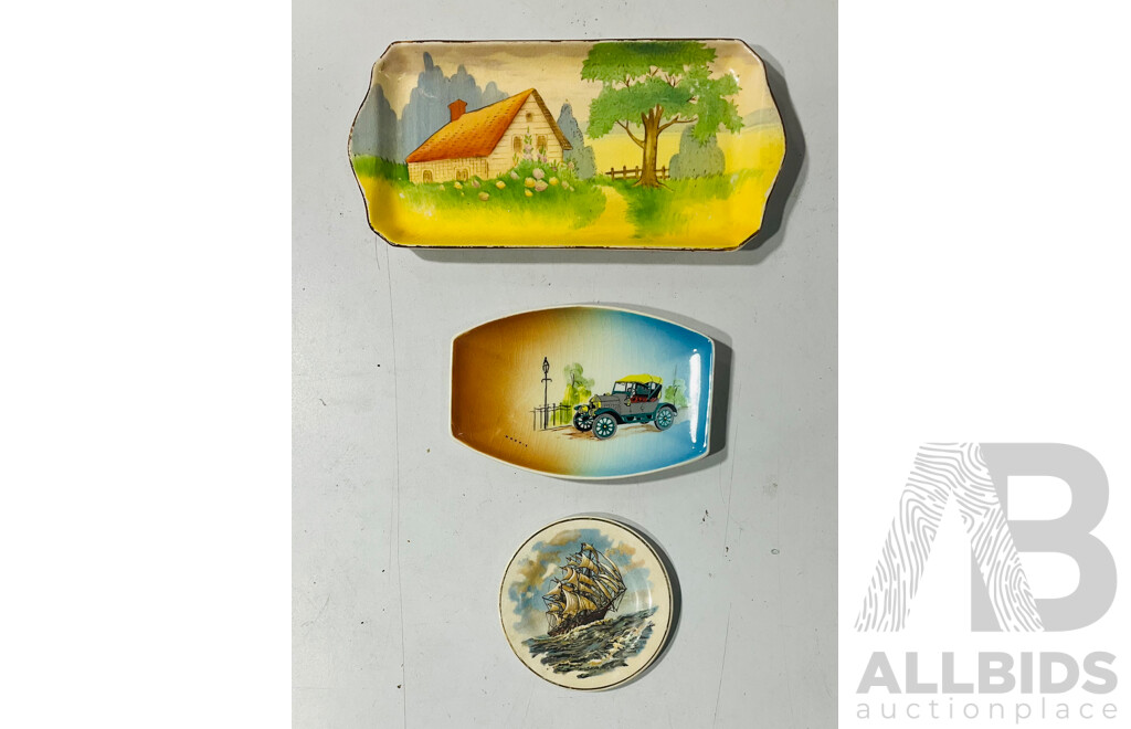 Collection of Lovely Ceramic Decorative Items Including Small Carriage Form Oil Lamp, Several Painted Plates and Platters and Small Fans
