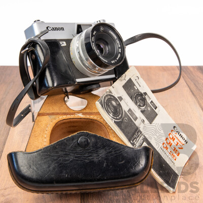 Vintage Canon QL 35mm Film Camera with Leather Case and Instruction Manual