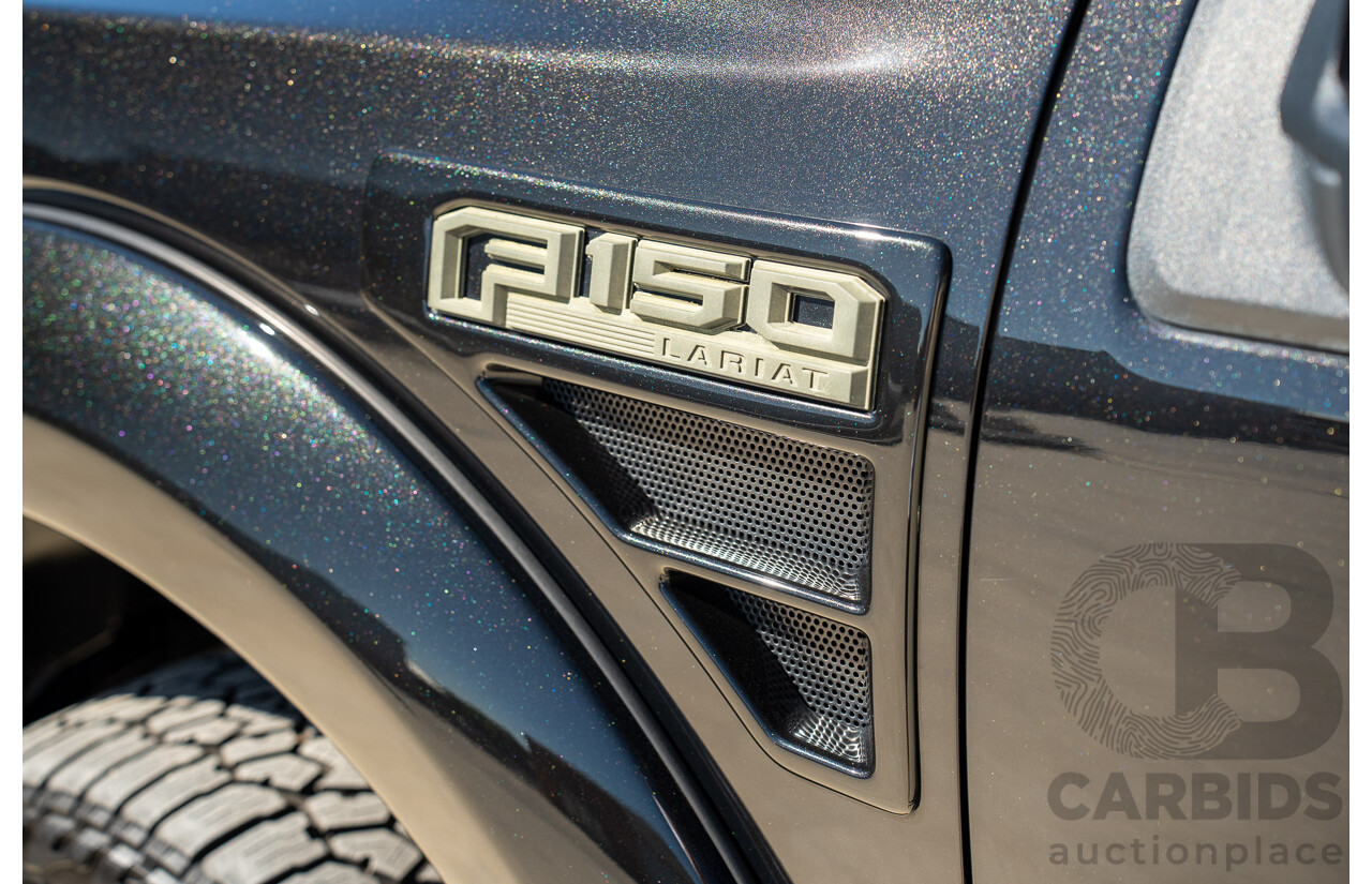 01/2015 Ford F-150 Lariat Black Ops by Tuscany (4x4) 4d SuperCrew Utiltiy Tuxedo Black Metallic Whipple Supercharged V8 5.0L