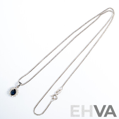 18ct White Gold Sapphire & Diamond Pendant & Chain, Est S0.62ct/TDW0.25ct 5.49 Grams