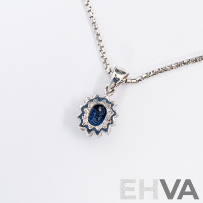 18ct White Gold Sapphire & Diamond Pendant & Chain, Est S0.62ct/TDW0.25ct 5.49 Grams