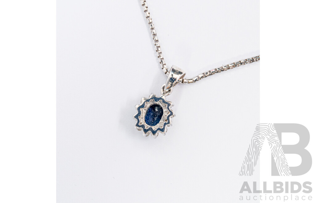 18ct White Gold Sapphire & Diamond Pendant & Chain, Est S0.62ct/TDW0.25ct 5.49 Grams