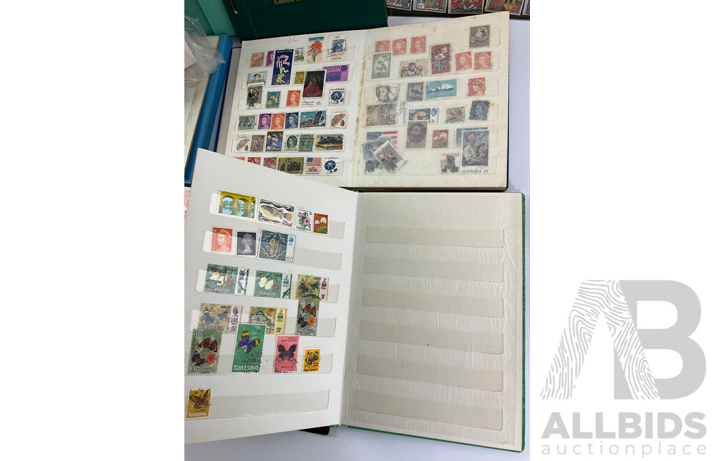 Collection of International Philately Including British Mint 1986 Mint Stamp Collectors Pack, All Nations Stamp Album, The Globe Stamp Album, USA, Indonesia, Netherland, Australia, Mongolia, UK and More