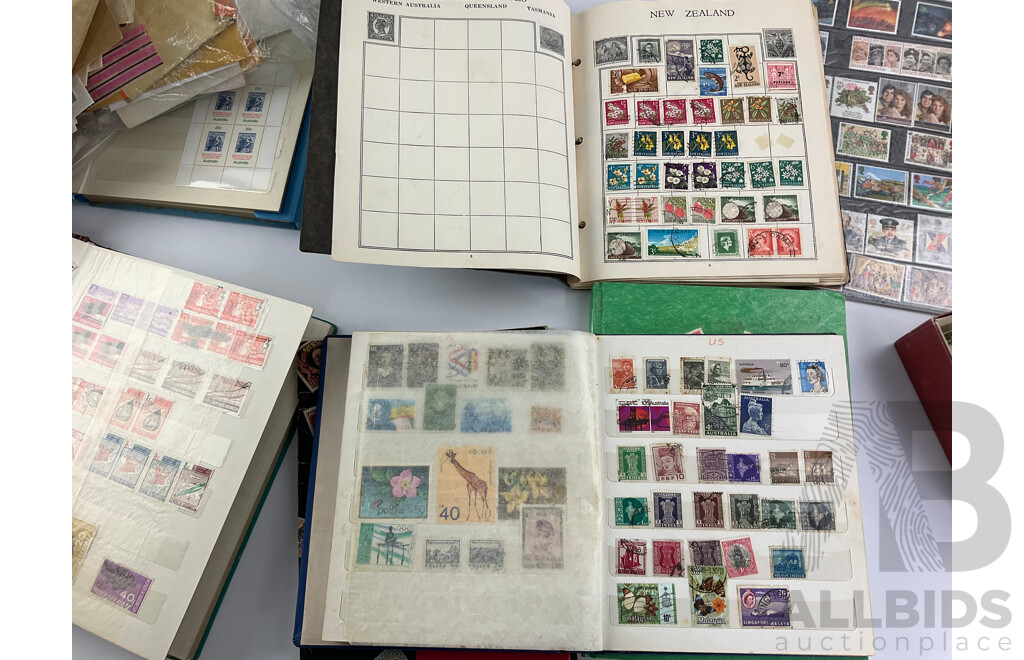 Collection of International Philately Including British Mint 1986 Mint Stamp Collectors Pack, All Nations Stamp Album, The Globe Stamp Album, USA, Indonesia, Netherland, Australia, Mongolia, UK and More