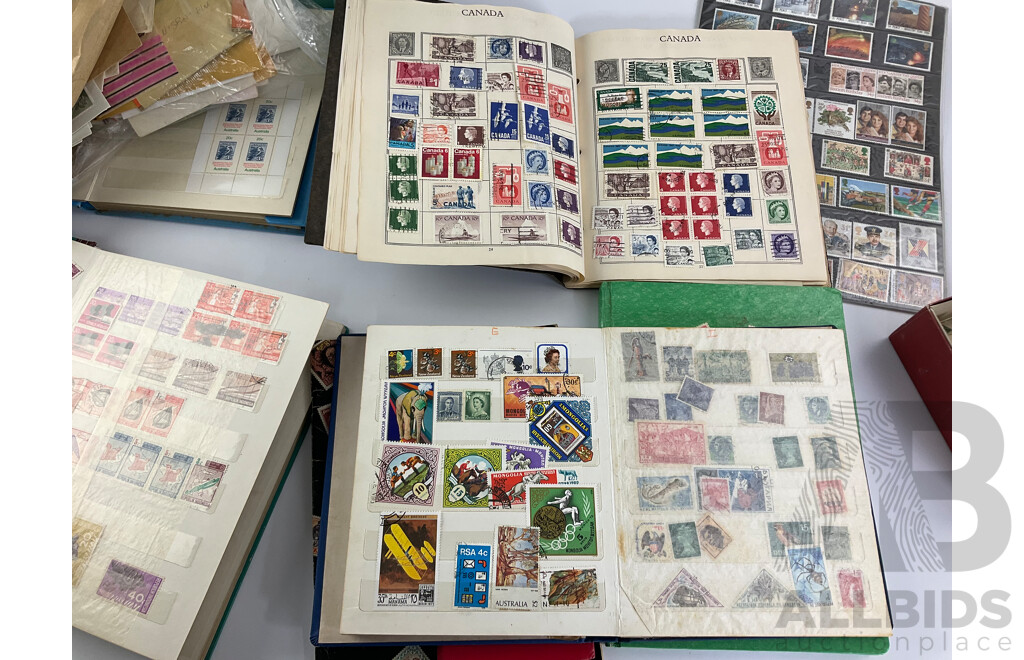 Collection of International Philately Including British Mint 1986 Mint Stamp Collectors Pack, All Nations Stamp Album, The Globe Stamp Album, USA, Indonesia, Netherland, Australia, Mongolia, UK and More