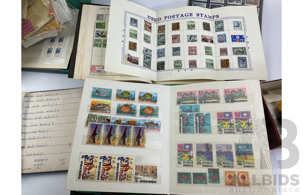 Collection of International Philately Including British Mint 1986 Mint Stamp Collectors Pack, All Nations Stamp Album, The Globe Stamp Album, USA, Indonesia, Netherland, Australia, Mongolia, UK and More