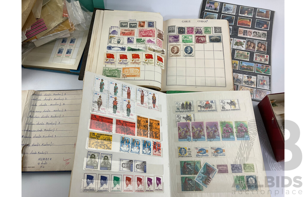 Collection of International Philately Including British Mint 1986 Mint Stamp Collectors Pack, All Nations Stamp Album, The Globe Stamp Album, USA, Indonesia, Netherland, Australia, Mongolia, UK and More
