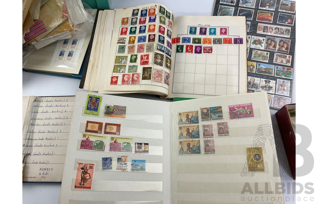Collection of International Philately Including British Mint 1986 Mint Stamp Collectors Pack, All Nations Stamp Album, The Globe Stamp Album, USA, Indonesia, Netherland, Australia, Mongolia, UK and More