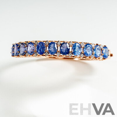 NEW - 14ct Rose Gold Tanzanite & Diamond Oval Hinged Bangle, T15.17ct/TDW0.19ct, 60mm, 22.67 Grams