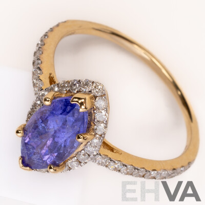 NEW - 14ct Yellow Gold Tanzanite & Diamond Halo Ring, S1.31ct/TDW0.37ct, Size L, 2.10 Grams