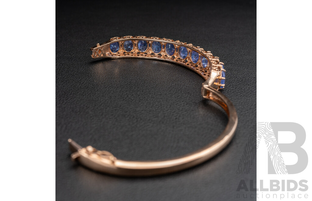 NEW - 14ct Rose Gold Tanzanite & Diamond Oval Hinged Bangle, T15.17ct/TDW0.19ct, 60mm, 22.67 Grams