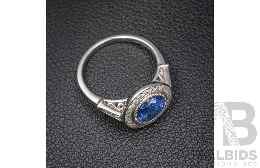 NEW - 14ct White Gold Tanzanite & Diamond Halo Ring, T2.37ct/TDW0.43ct, Size N, 4.66 Grams