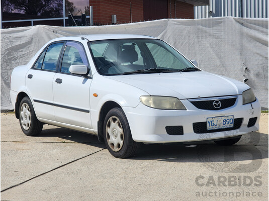 3/2002 Mazda 323 Protege Shades  4d Sedan White 1.6L