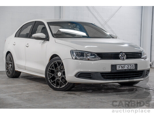 10/2011 Volkswagen Jetta 118 TSI 1KM MY12 4d Sedan Candy White Twincharged 1.4L