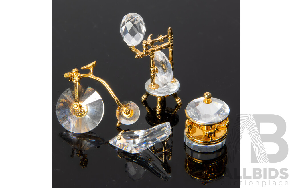 Collection Four Swarovski Austrian Crystal Memories Comprising High Heeled Shoe, Carousel, Penny Farthing & Spinning Wheel, Three in Original Box and Packaging