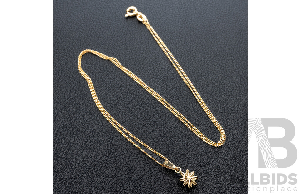 9ct Ruby & Diamond Pendant, TDW 0.10ct, on a 9ct Fine Curb Link Necklace, 45cm, 1.56 Grams