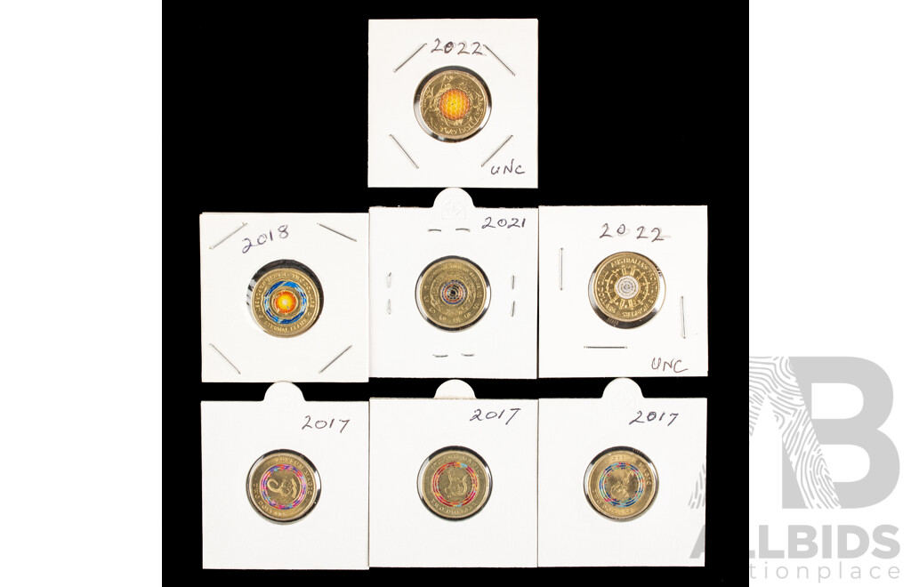 Seven Australian Commemorative Two Dollar Coins Including 2022 Honey Bee, 2022 Front Line Workers, Three 2017 Possum Magic, 2021 Indigenous Military Service, 2018 Lest We Forget
