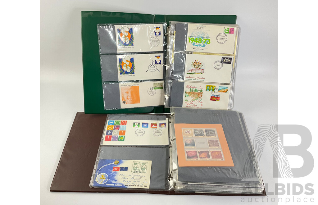 Two Albums of Australian 1970-80's First Day Covers and Stamp Packs Including 1984 Christmas, AUSIPEX, Conservation, Selected Issues, 1982 QE2 Birthday, Antarctic Territory and More