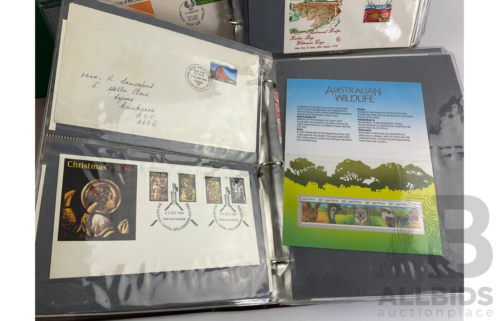 Two Albums of Australian 1970-80's First Day Covers and Stamp Packs Including 1984 Christmas, AUSIPEX, Conservation, Selected Issues, 1982 QE2 Birthday, Antarctic Territory and More