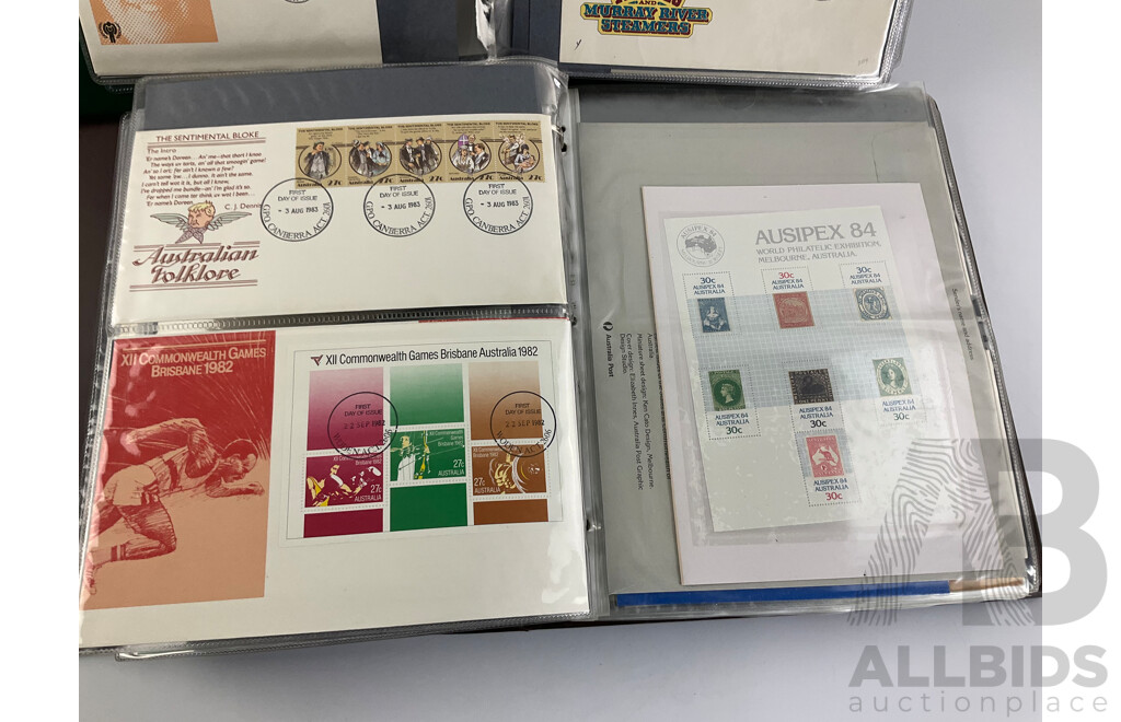 Two Albums of Australian 1970-80's First Day Covers and Stamp Packs Including 1984 Christmas, AUSIPEX, Conservation, Selected Issues, 1982 QE2 Birthday, Antarctic Territory and More