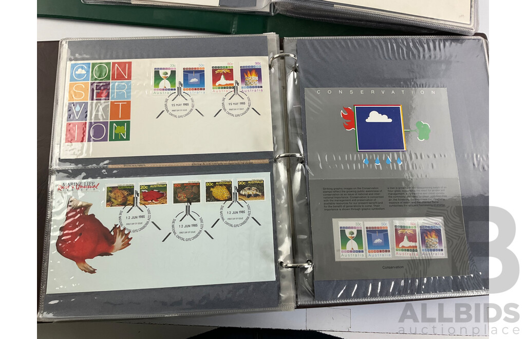Two Albums of Australian 1970-80's First Day Covers and Stamp Packs Including 1984 Christmas, AUSIPEX, Conservation, Selected Issues, 1982 QE2 Birthday, Antarctic Territory and More
